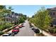 Street view of Towns on Thompson townhomes with parked cars at 540 Fisher Dr # 46, Alpharetta, GA 30009