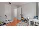 bedroom with hardwood floors and a white door at 708 Argonne Ne Ave # 5, Atlanta, GA 30308