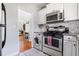 Well-lit modern kitchen and an open layout that connects to the living and dining areas at 708 Argonne Ne Ave # 5, Atlanta, GA 30308