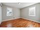 Bright bedroom with hardwood floors and ample natural light at 8554 Taylor Rd, Riverdale, GA 30274