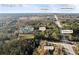 Aerial view of Covington home shows proximity to US Hwy 278, Stone Mountain and surrounding wooded acreage at 200 Mcguirts Bridge Rd, Covington, GA 30014