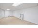 Unfinished basement with tiled floors and storage at 200 Mcguirts Bridge Rd, Covington, GA 30014