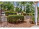 Landscaped backyard with a view of trees and parking at 2955 Seven Pines Ln # 203, Atlanta, GA 30339