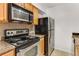 Kitchen with granite countertops and stainless steel appliances at 2955 Seven Pines Ln # 203, Atlanta, GA 30339