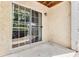 Private patio with sliding glass doors and view of nature at 2955 Seven Pines Ln # 203, Atlanta, GA 30339