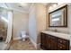 Clean bathroom with shower, toilet and granite vanity at 3327 High Noontide Way, Acworth, GA 30101