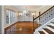 Bright dining room featuring hardwood floors and a chandelier at 3327 High Noontide Way, Acworth, GA 30101