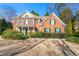 Brick house with a two-car garage and well-manicured lawn at 3853 Cohutta Pass, Marietta, GA 30062