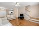 Open living room with hardwood floors and a view into the kitchen at 3853 Cohutta Pass, Marietta, GA 30062