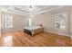 Spacious main bedroom with hardwood floors and coffered ceiling at 3853 Cohutta Pass, Marietta, GA 30062