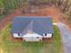 Aerial view of house, showing roofline and landscaping at 410 N Carroll N St, Bowdon, GA 30108