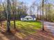 New construction home nestled in a wooded lot with a large yard at 410 N Carroll N St, Bowdon, GA 30108