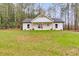 Newly built home, white siding, gray roof, and a front porch at 410 N Carroll N St, Bowdon, GA 30108