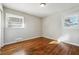 Bright bedroom with hardwood floors and ample natural light at 8586 Taylor Rd, Riverdale, GA 30274