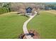 House with long driveway and large lawn at 1586 Highway 11 N, Social Circle, GA 30025