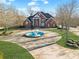 Brick home with circular drive and landscaping at 1586 Highway 11 N, Social Circle, GA 30025