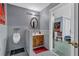 Basement bathroom with urinal and updated vanity at 1586 Highway 11 N, Social Circle, GA 30025