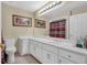 Clean bathroom with updated vanity and shower/tub combo at 1586 Highway 11 N, Social Circle, GA 30025