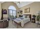 Main bedroom with a king-size bed and large window at 1586 Highway 11 N, Social Circle, GA 30025
