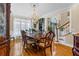Formal dining room with hardwood floors and large windows at 1586 Highway 11 N, Social Circle, GA 30025