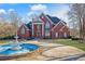 Two-story home with fountain and landscaping at 1586 Highway 11 N, Social Circle, GA 30025