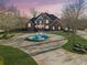 Brick home with fountain and circular driveway at 1586 Highway 11 N, Social Circle, GA 30025