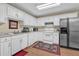 Modern kitchen with stainless steel appliances and ample counter space at 1586 Highway 11 N, Social Circle, GA 30025