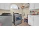Convenient laundry room with washer, dryer, and ample storage at 1586 Highway 11 N, Social Circle, GA 30025