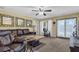 Spacious living room with large windows and patio access at 1586 Highway 11 N, Social Circle, GA 30025