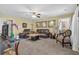 Bright living room featuring comfortable seating and natural light at 1586 Highway 11 N, Social Circle, GA 30025