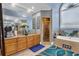 Spacious bathroom with double vanity, soaking tub, and walk-in shower at 1586 Highway 11 N, Social Circle, GA 30025