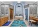 Luxurious bathroom with a soaking tub, double vanity, and walk-in shower at 1586 Highway 11 N, Social Circle, GA 30025
