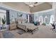 Bright main bedroom with sitting area and large windows offering scenic views at 1586 Highway 11 N, Social Circle, GA 30025