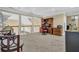 Spacious home office loft with built-in wooden desk and chair at 1586 Highway 11 N, Social Circle, GA 30025