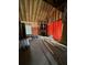 Unfinished living room with fireplace and exposed framing at 2615 Virginia Cv, Riverdale, GA 30296