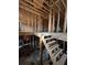 Unfinished interior with wooden staircase and upper level framing at 2615 Virginia Cv, Riverdale, GA 30296