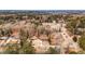 Aerial view of house and surrounding neighborhood, showcasing wooded area and quiet street at 2725 Shoreland Sw Dr, Atlanta, GA 30331