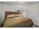 Simple bedroom with a queen bed and hardwood floors at 2725 Shoreland Sw Dr, Atlanta, GA 30331