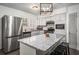 Updated kitchen featuring stainless steel appliances and granite countertops at 2725 Shoreland Sw Dr, Atlanta, GA 30331