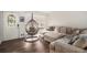 Inviting living room with an egg chair, comfortable seating, and stylish decor at 2725 Shoreland Sw Dr, Atlanta, GA 30331