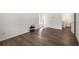 Simple living room featuring hardwood floors and access to the outdoors at 2725 Shoreland Sw Dr, Atlanta, GA 30331