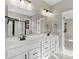 Bathroom featuring double sink vanity, large mirror, and modern fixtures at 44 Easton Park Blvd, Dallas, GA 30157