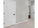 Bedroom featuring neutral walls, carpeting, and white doors at 44 Easton Park Blvd, Dallas, GA 30157