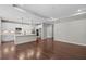 Open floor plan kitchen featuring white cabinets, center island, and stainless steel appliances at 44 Easton Park Blvd, Dallas, GA 30157