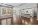 Open concept living area features a kitchen, dining area and living room with tons of natural light at 44 Easton Park Blvd, Dallas, GA 30157