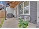 Cozy back patio with seating area, grill, and mature plantings at 687 Banton Nw Dr, Atlanta, GA 30318
