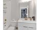 Modern bathroom with white vanity and gold fixtures at 687 Banton Nw Dr, Atlanta, GA 30318