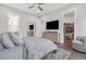 Main bedroom with large bed and walk-in closet at 687 Banton Nw Dr, Atlanta, GA 30318