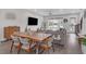 Open dining room with mid-century modern table and chairs at 687 Banton Nw Dr, Atlanta, GA 30318
