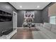 Home office with a glass desk and comfortable seating at 687 Banton Nw Dr, Atlanta, GA 30318